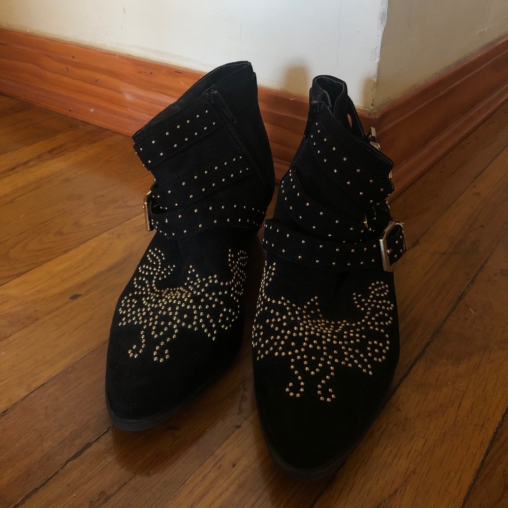 Black booties with gold studs